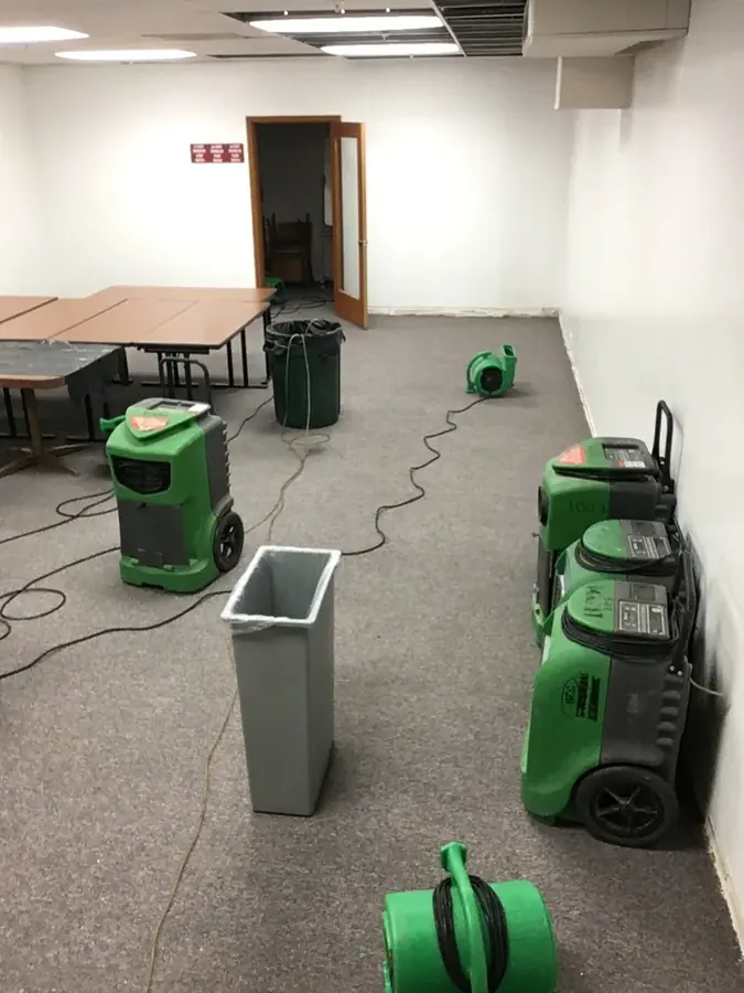 Dehumidifiers drying a room in Derry, NH